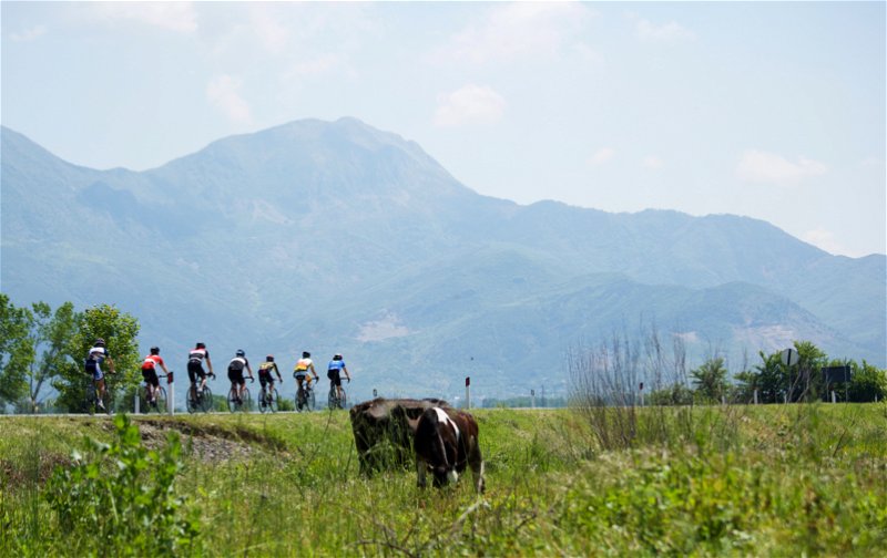 Cycling beneath the limestone peaks of the Dinaric Alps