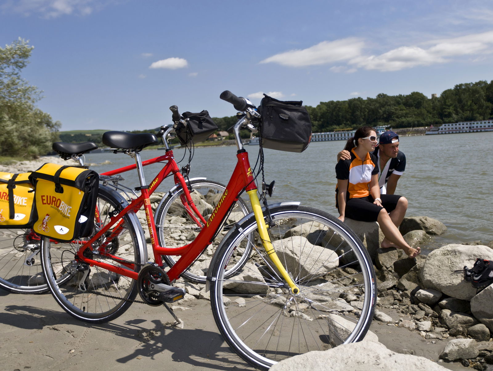 The included bikes are fitted with a single pannier and a handlebar bag