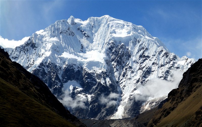 The imposing face of Salkantay, towering over the trail